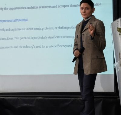 Ms. Dwivedi presenting on entrepreneurial potential in aviation — identifying opportunities, mobilising resources, and driving innovation.