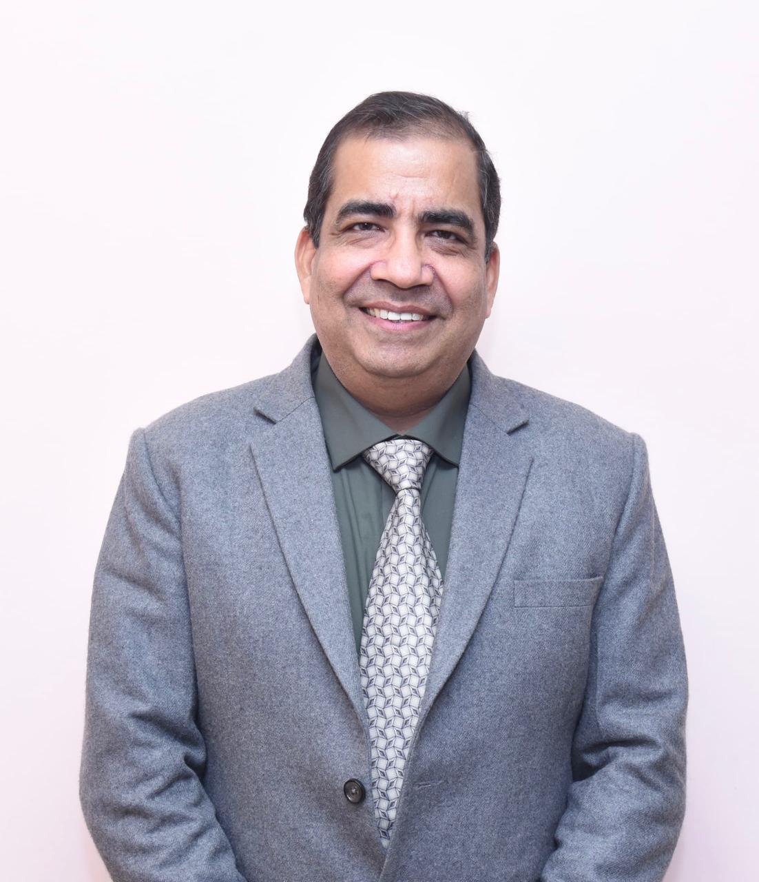 Mr. Neeraj Mittal